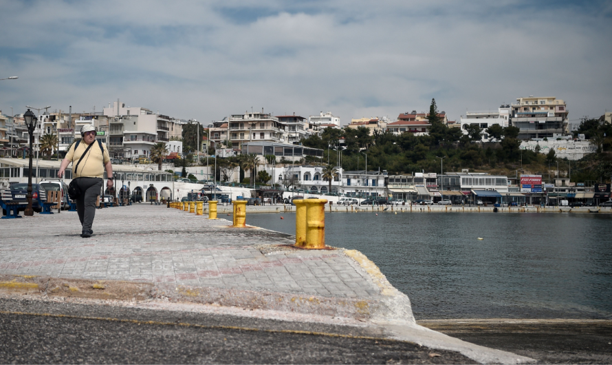 Body found near Greek beach with 22-pound barbell attached to leg, coast guard says