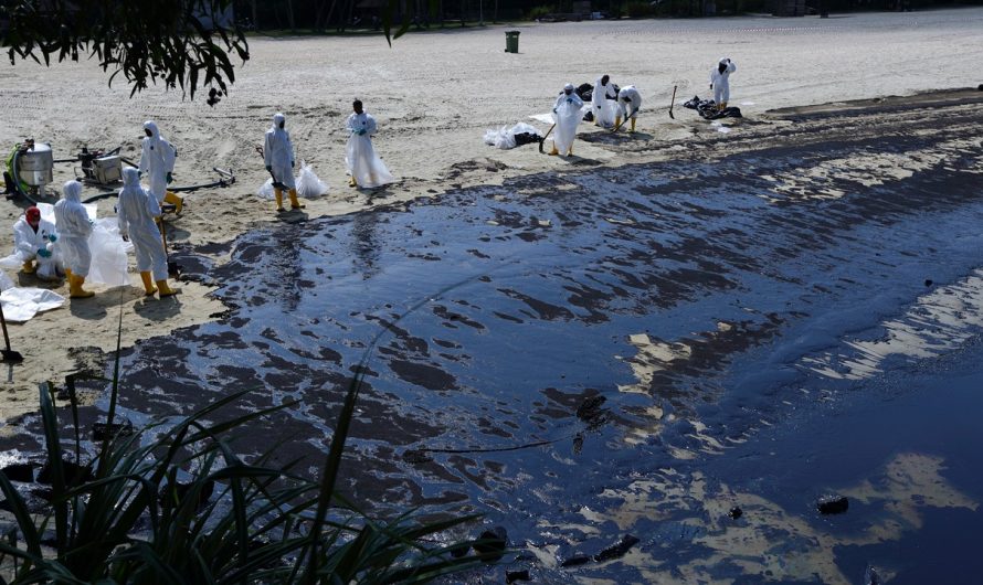 Singapore authorities say ship that hit tanker, causing oil spill, reported sudden loss of control